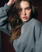 Conjunto deportivo crop con sudadera y shorts